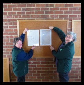 Kathy and Jenny organising new display boards