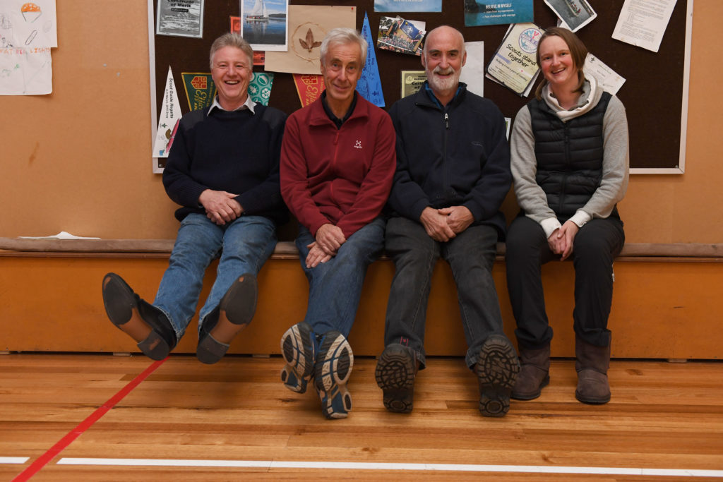 Four people sitting down